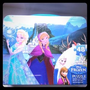Disney frozen puzzle with lunchbox included.